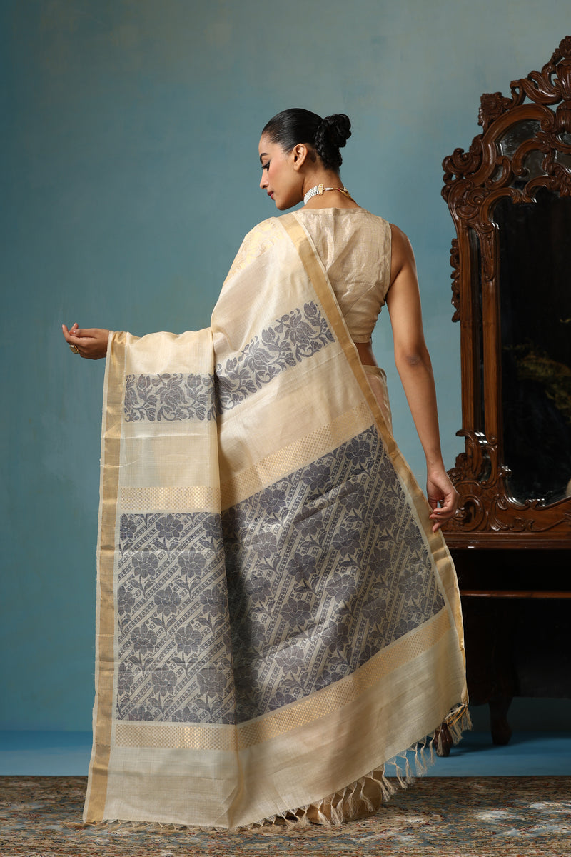 Daisy handmade beige Kosa Silk saree with lotus design and black palla