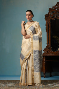 Daisy handmade beige Kosa Silk saree with lotus design and black palla