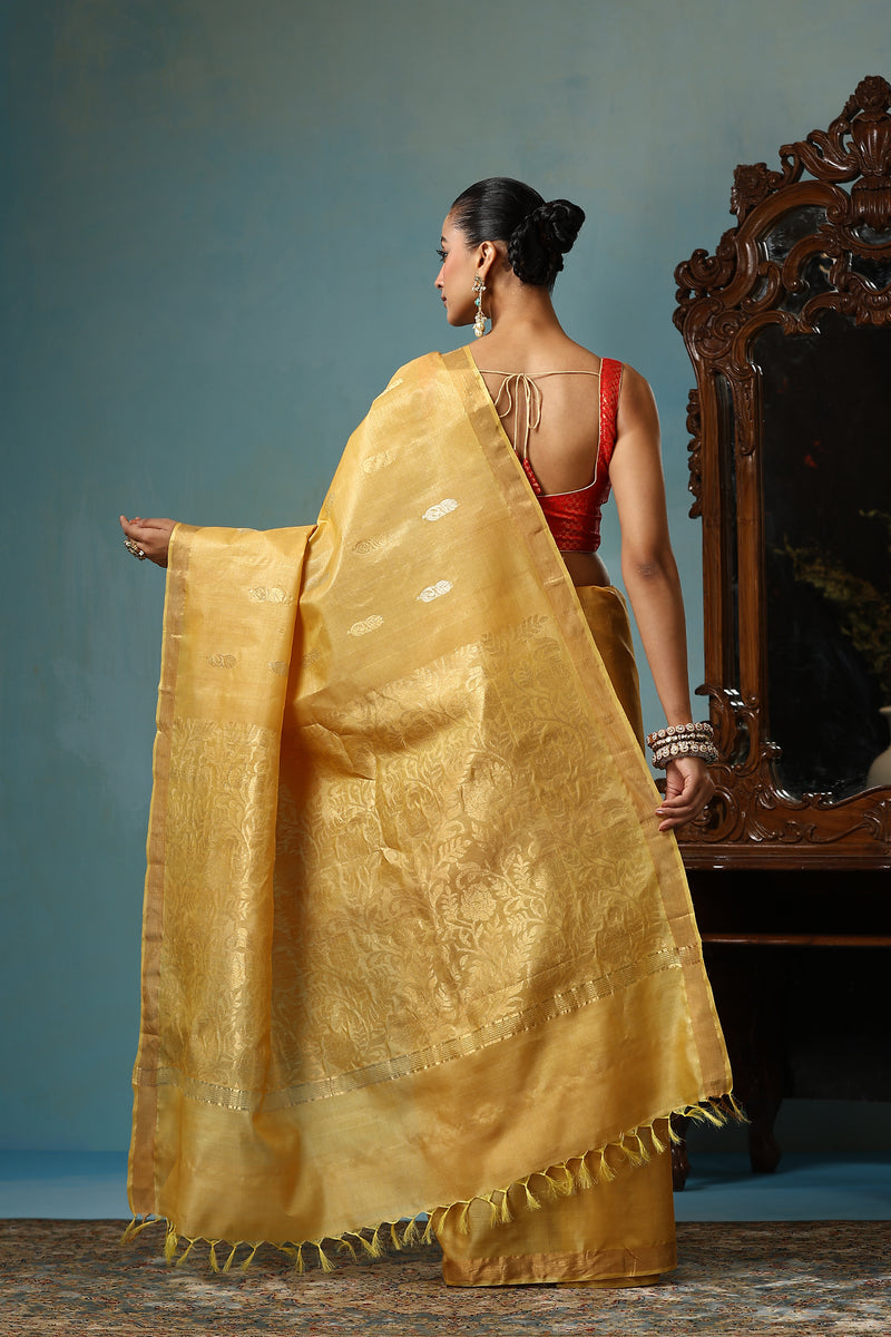 Marigold handmade light yellow-gold Kosa Silk saree with flower and leaf designs on the palla